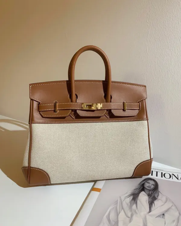 RAVEN TOTE IN CANVAS AND SWIFT LEATHER