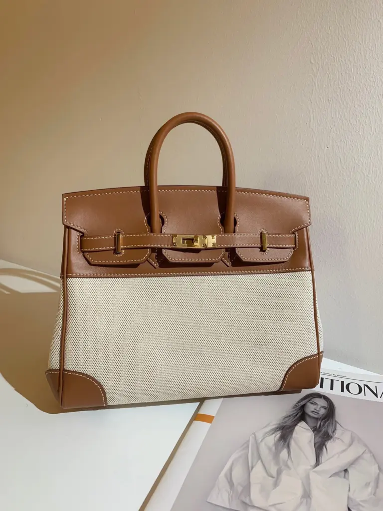 RAVEN TOTE IN CANVAS AND SWIFT LEATHER
